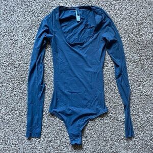 skims blue long sleeve bodysuit